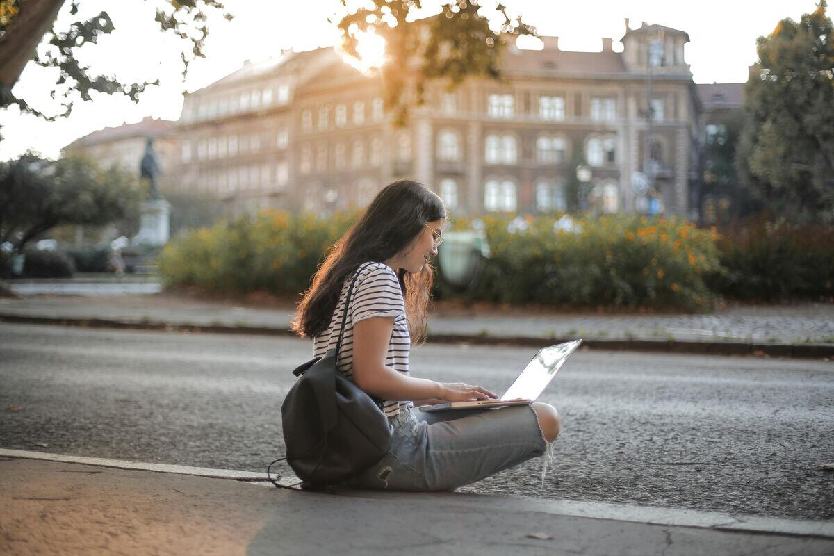 Female college student working on one-on-one with her online ACT tutor preparing for the ACT test.